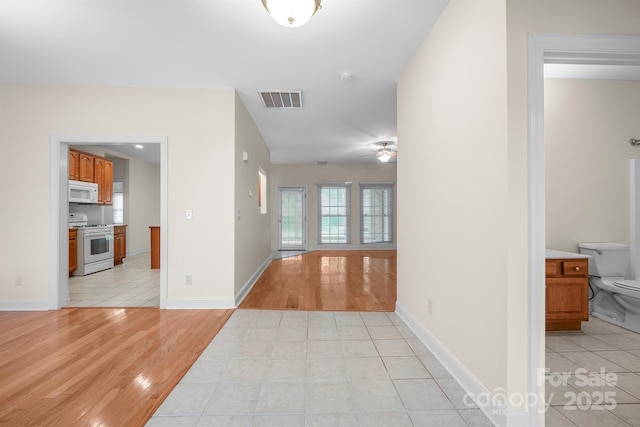104 Mooreland Dr NE, Conover, NC 28613 - hall featuring light wood-style floors and baseboards
