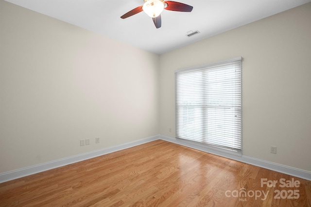 104 Mooreland Dr NE, Conover, NC 28613 - spare room featuring a ceiling fan and wood finished floors
