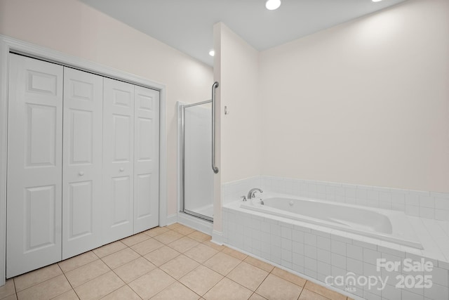 104 Mooreland Dr NE, Conover, NC 28613 - full bathroom featuring a bath, tile patterned flooring, a closet, a stall shower, and recessed lighting