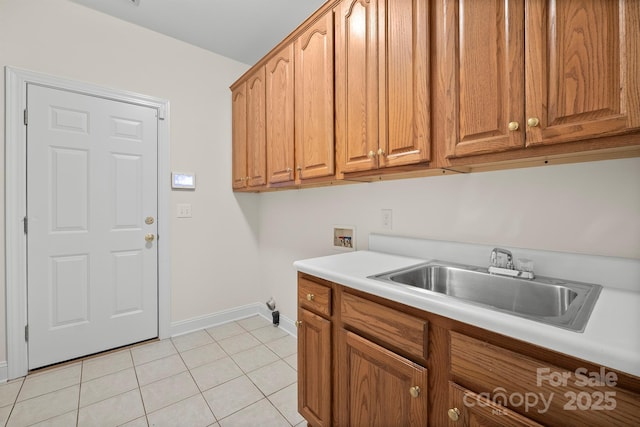 104 Mooreland Dr NE, Conover, NC 28613 - laundry room with hookup for a washing machine, cabinet space, and light tile patterned floors