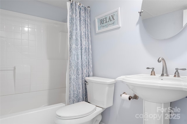 1489 L R Schronce Ln, Iron Station, NC 28080 - full bathroom featuring toilet and shower / tub combo with curtain