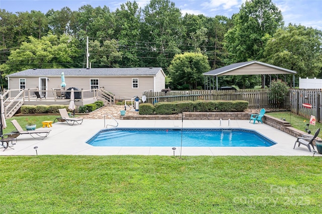1489 L R Schronce Ln, Iron Station, NC 28080 - view of swimming pool featuring a patio area and a deck