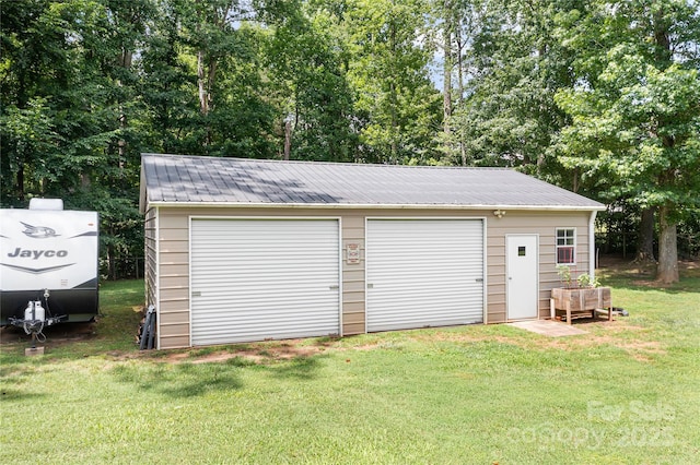 1489 L R Schronce Ln, Iron Station, NC 28080 - detached garage with view of wooded area