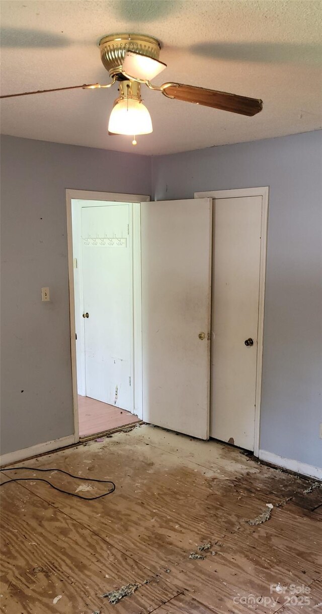 7705 Stone Canyon Ln, Charlotte, NC 28227 - unfurnished bedroom with a closet and ceiling fan