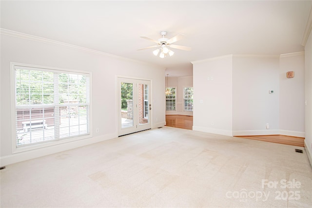2019 Heirloom Ct, Matthews, NC 28104 - empty room with crown molding, ceiling fan, and light carpet