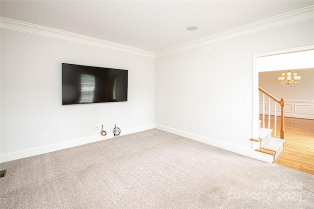 2019 Heirloom Ct, Matthews, NC 28104 - unfurnished living room with ornamental molding, a chandelier, carpet flooring, and stairs