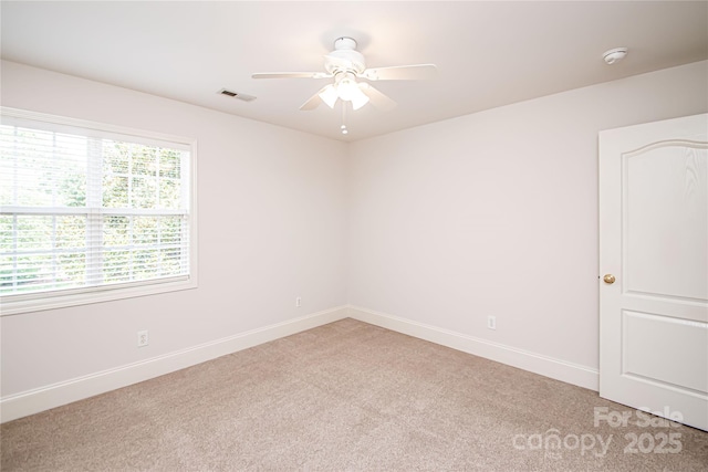 2019 Heirloom Ct, Matthews, NC 28104 - spare room with light carpet, a ceiling fan, and a smoke detector