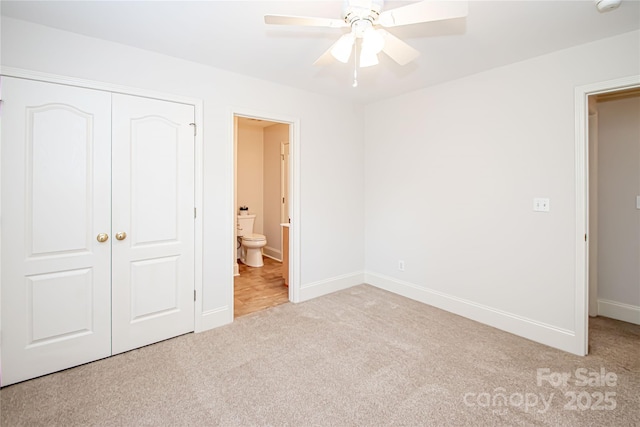 2019 Heirloom Ct, Matthews, NC 28104 - unfurnished bedroom featuring carpet, a closet, connected bathroom, and ceiling fan