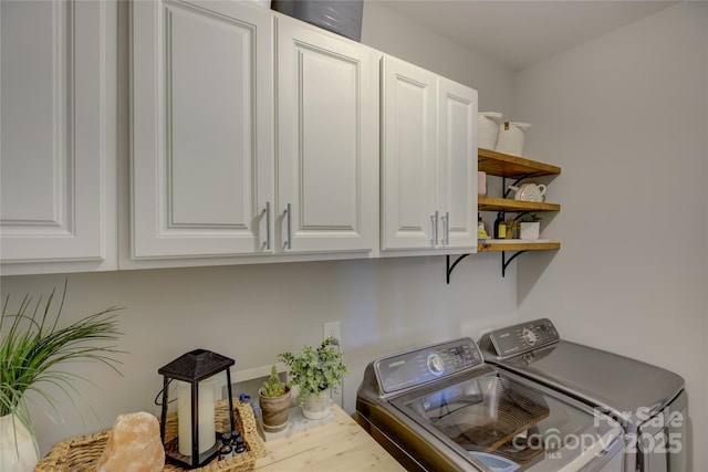 17537 Caddy Ct, Charlotte, NC 28278 - laundry room with washing machine and dryer and cabinet space