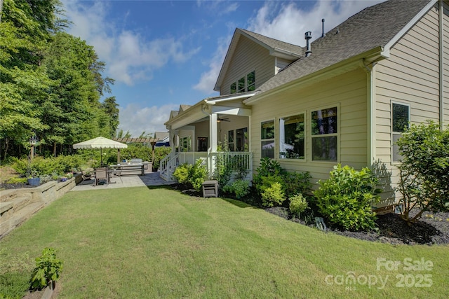 17537 Caddy Ct, Charlotte, NC 28278 - view of grassy yard with a ceiling fan and a patio