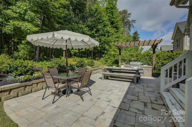 17537 Caddy Ct, Charlotte, NC 28278 - view of patio featuring outdoor dining area, a pergola, and area for grilling
