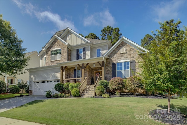 17537 Caddy Ct, Charlotte, NC 28278 - craftsman-style home featuring stone siding, covered porch, board and batten siding, and a garage