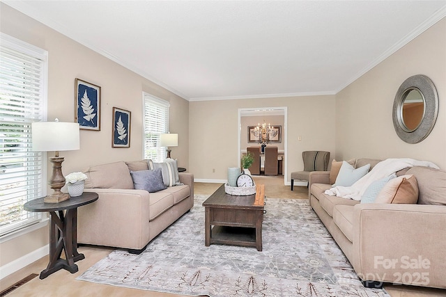 3304 Chilham Pl, Charlotte, NC 28226 - living room featuring ornamental molding and a chandelier