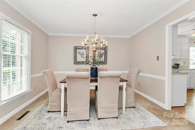 3304 Chilham Pl, Charlotte, NC 28226 - dining area featuring a chandelier, healthy amount of natural light, and crown molding