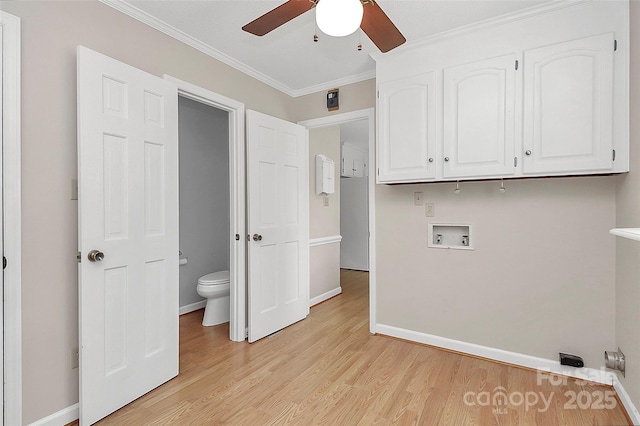 3304 Chilham Pl, Charlotte, NC 28226 - laundry room with cabinet space, washer hookup, a ceiling fan, ornamental molding, and light wood-style flooring
