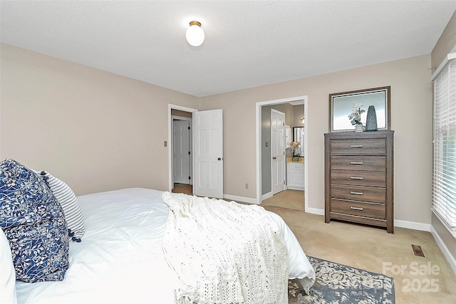 3304 Chilham Pl, Charlotte, NC 28226 - bedroom with light colored carpet and ensuite bathroom