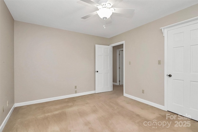 3304 Chilham Pl, Charlotte, NC 28226 - unfurnished bedroom featuring light carpet and a ceiling fan