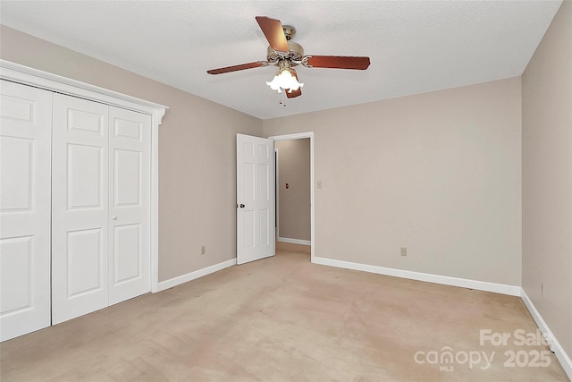3304 Chilham Pl, Charlotte, NC 28226 - unfurnished bedroom with light colored carpet, a closet, and ceiling fan