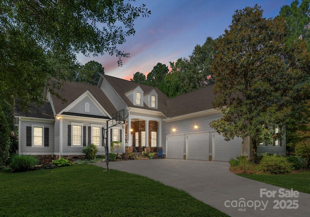 4536 Rustling Woods Dr, Denver, NC 28037 - view of front facade featuring concrete driveway, a lawn, and a garage