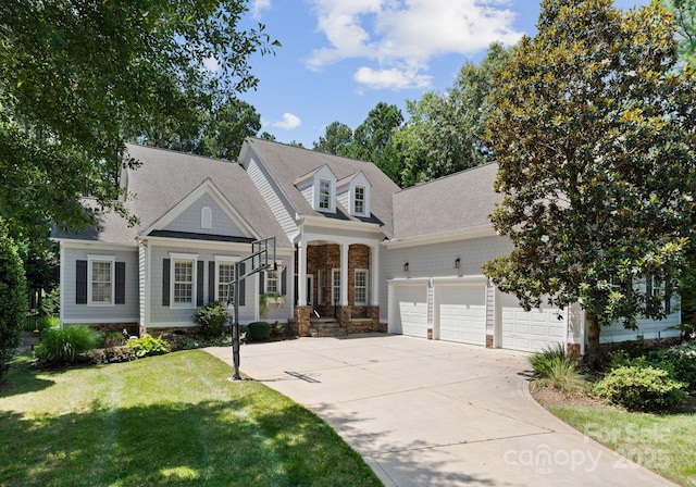 4536 Rustling Woods Dr, Denver, NC 28037 - view of front of home with a front yard, driveway, a garage, and roof with shingles
