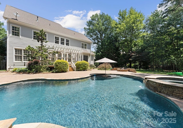 4536 Rustling Woods Dr, Denver, NC 28037 - view of pool featuring a pergola, a patio, and a pool with connected hot tub