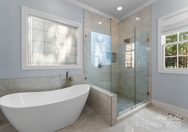 4536 Rustling Woods Dr, Denver, NC 28037 - bathroom with a freestanding bath, crown molding, a shower stall, and marble finish floors
