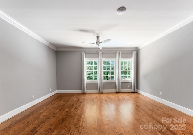 4536 Rustling Woods Dr, Denver, NC 28037 - spare room with crown molding, ceiling fan, and wood finished floors