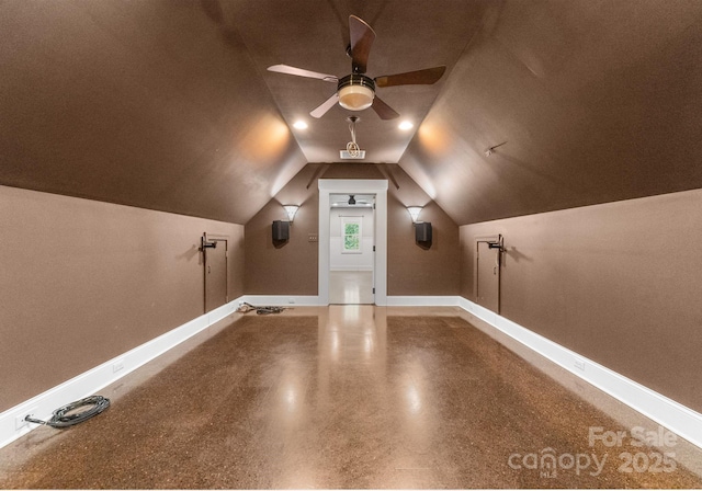 4536 Rustling Woods Dr, Denver, NC 28037 - additional living space with ceiling fan, speckled floor, and vaulted ceiling