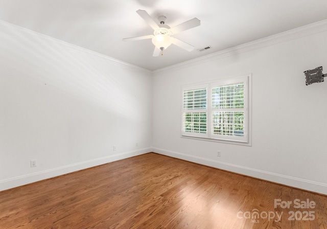 4536 Rustling Woods Dr, Denver, NC 28037 - spare room with ornamental molding, wood finished floors, and ceiling fan