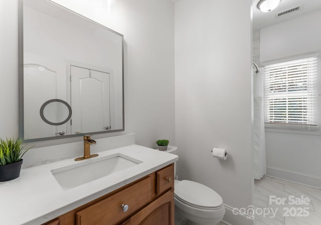 4536 Rustling Woods Dr, Denver, NC 28037 - bathroom featuring marble look tile flooring, vanity, and a shower with shower curtain