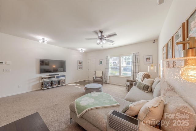 4113 Bent Green Ln, Monroe, NC 28112 - carpeted living area with a ceiling fan and baseboards