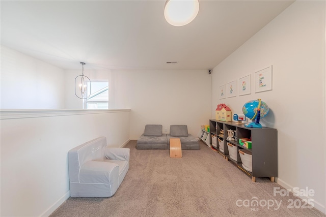 4113 Bent Green Ln, Monroe, NC 28112 - recreation room with a chandelier and carpet floors
