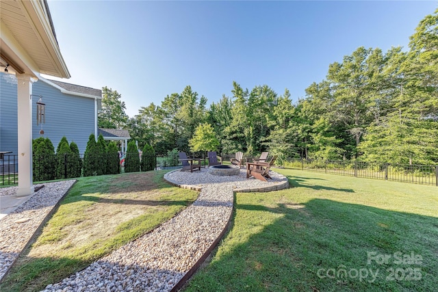 4113 Bent Green Ln, Monroe, NC 28112 - fenced backyard with a fire pit