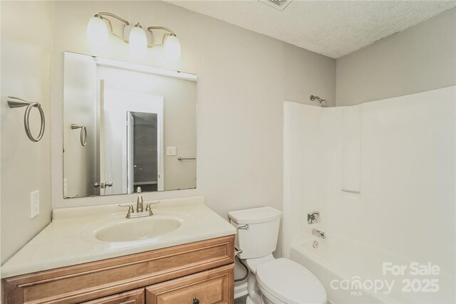 4937 Post Oak Ln, Rock Hill, SC 29732 - bathroom featuring vanity, tub / shower combination, and a textured ceiling