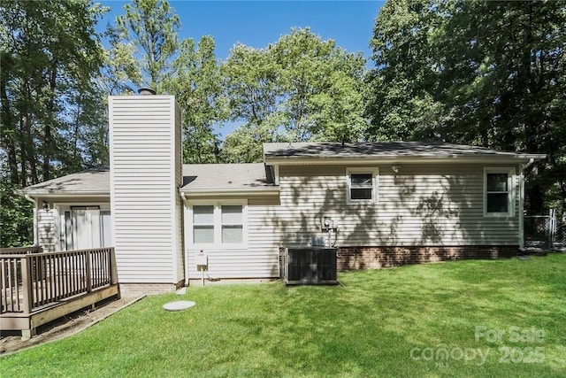 4937 Post Oak Ln, Rock Hill, SC 29732 - rear view of property with a yard, a chimney, and a wooden deck