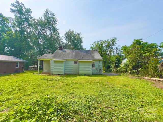 413 Forest Pl NW, Lenoir, NC 28645 - back of house with a yard and crawl space