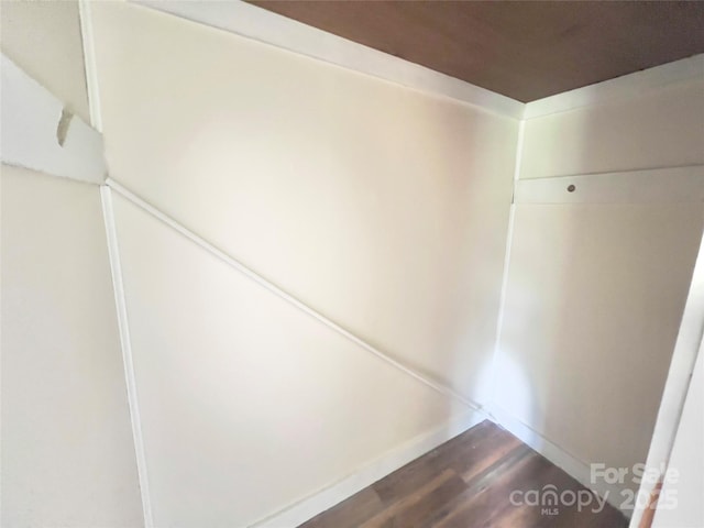 413 Forest Pl NW, Lenoir, NC 28645 - detailed view of wood finished floors and baseboards
