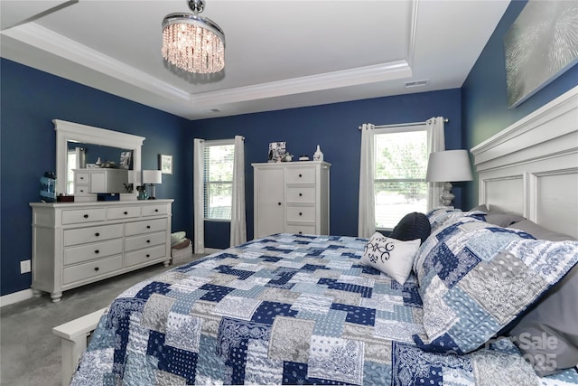 9541 Festival Way, Charlotte, NC 28215 - bedroom featuring a tray ceiling, carpet floors, a chandelier, and crown molding