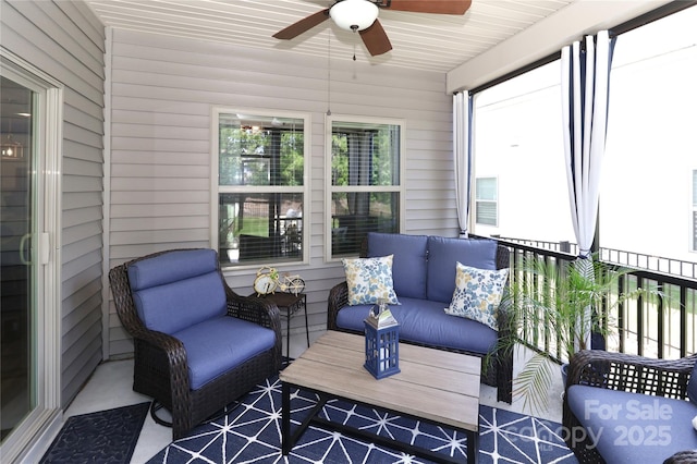 9541 Festival Way, Charlotte, NC 28215 - sunroom featuring a ceiling fan and an outdoor hangout area