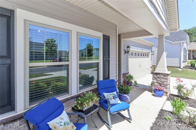 9541 Festival Way, Charlotte, NC 28215 - covered porch with a garage and driveway