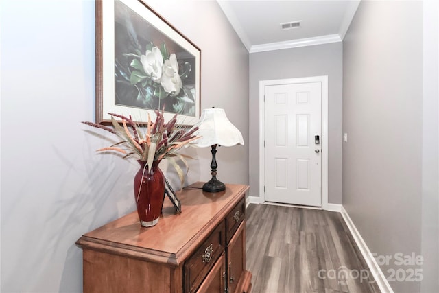 9541 Festival Way, Charlotte, NC 28215 - doorway with wood finished floors and crown molding
