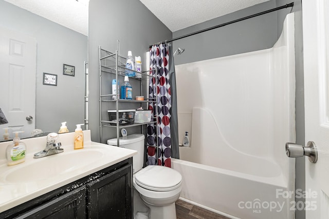 704 Willow Rd, Salisbury, NC 28147 - full bathroom featuring wood finished floors, vanity, a textured ceiling, and shower / bath combination with curtain