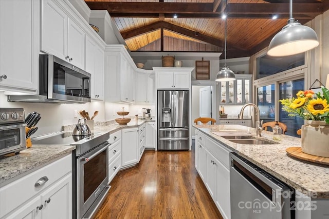 307 E Allenton St, Mount Gilead, NC 27306 - kitchen with appliances with stainless steel finishes, wooden ceiling, white cabinets, dark wood-type flooring, and pendant lighting
