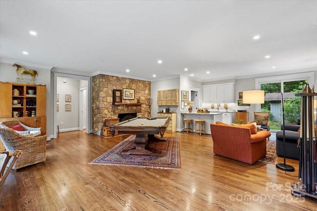 307 E Allenton St, Mount Gilead, NC 27306 - recreation room with crown molding, billiards, recessed lighting, a stone fireplace, and wood finished floors