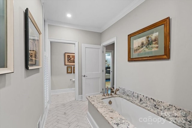 307 E Allenton St, Mount Gilead, NC 27306 - bathroom with a bath, ornamental molding, and brick patterned flooring