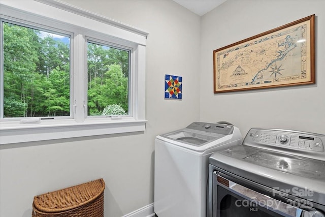307 E Allenton St, Mount Gilead, NC 27306 - washroom featuring washing machine and dryer and baseboards