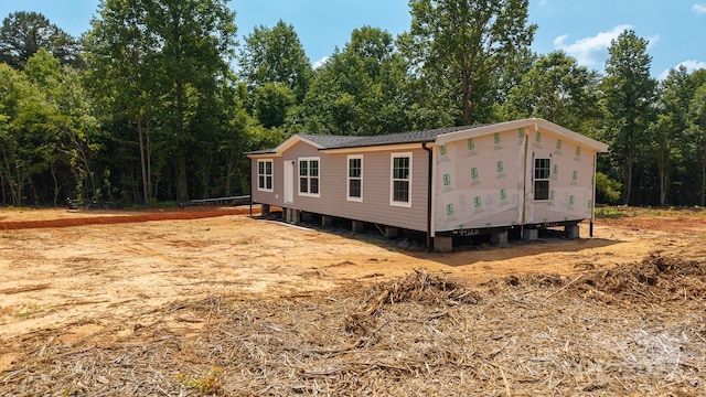 1853 Hill River Rd Unit 1, Hiddenite, NC 28636 - view of property exterior with roof with shingles