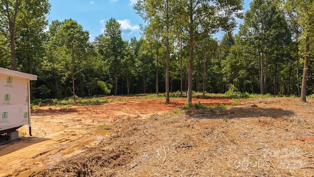 1853 Hill River Rd Unit 1, Hiddenite, NC 28636 - view of yard with a forest view
