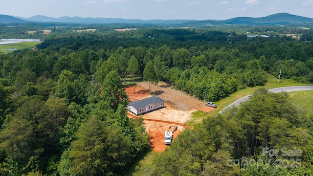 1853 Hill River Rd Unit 1, Hiddenite, NC 28636 - aerial view of a forest and mountains