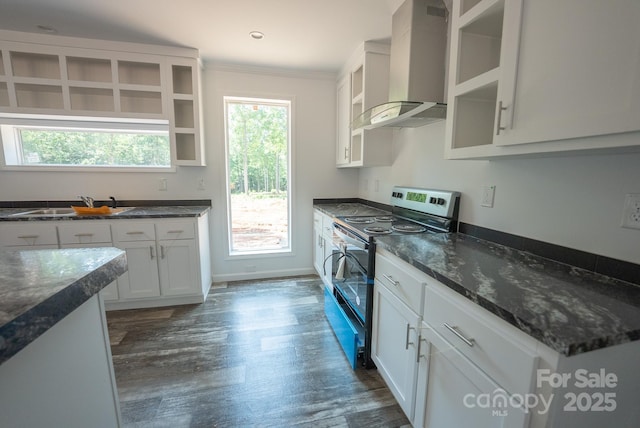 1853 Hill River Rd Unit 1, Hiddenite, NC 28636 - kitchen with stainless steel range with electric stovetop, wall chimney range hood, dark wood-style flooring, white cabinetry, and dark stone countertops
